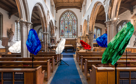 Church interior with colourful sculptures
